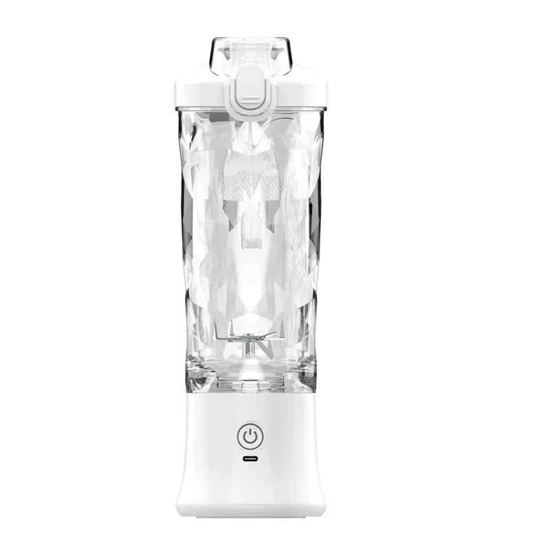 Clear blender with white base on a white background